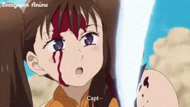 a close up of a girl with blood on her face and the words capt written on the bottom .