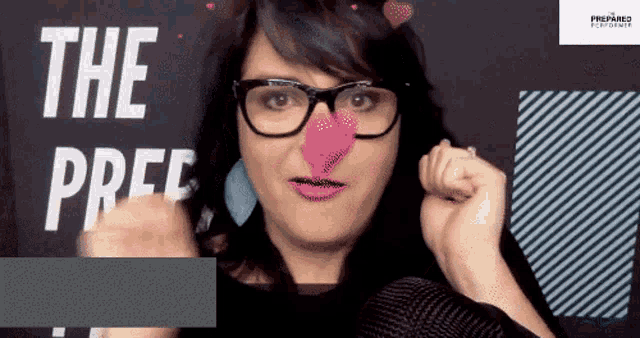 a woman with glasses and a pink nose is making a funny face with the words the pree behind her