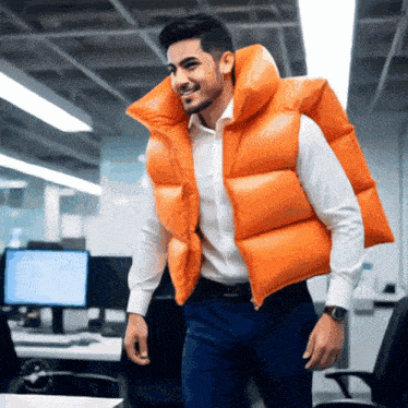 a man wearing an orange vest and a watch