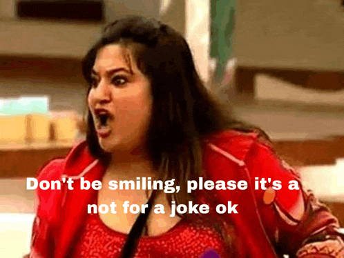 a woman in a red jacket says do n't be smiling please it 's not for a joke ok