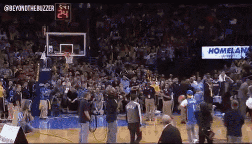 a basketball game is underway and the score is 24