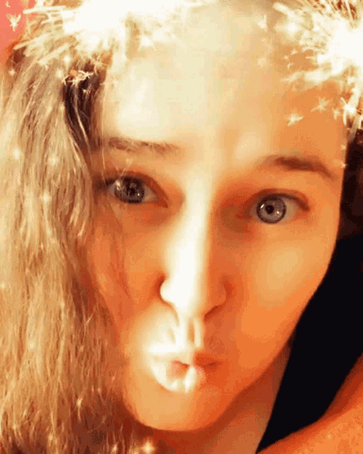 a close up of a woman making a funny face