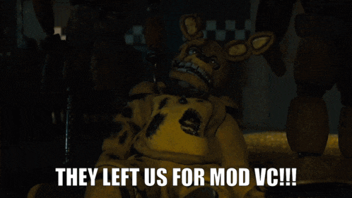 a yellow stuffed animal with the words they left us for mod vc written below it