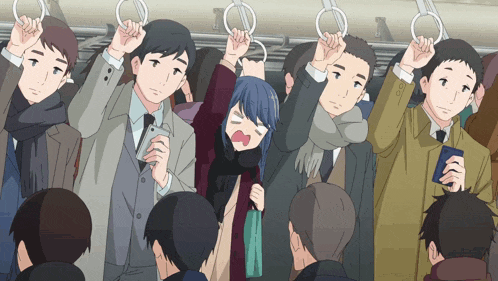 a group of people are riding a bus and one of them is holding a handle