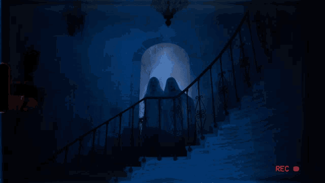 two ghosts are standing on a set of stairs with a red rec button in the corner