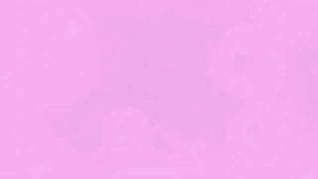 a man wearing headphones and glasses is surrounded by pink bubbles and stars .