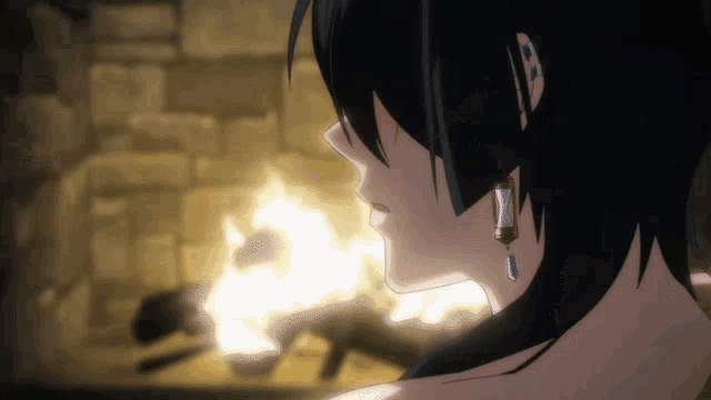 a close up of a woman 's face in front of a fireplace