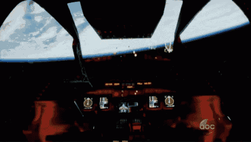 a blurred image of a cockpit with abc written on the bottom
