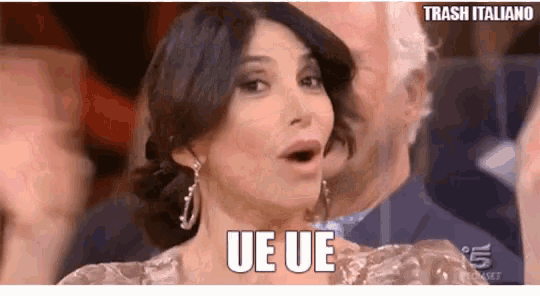 a woman with a surprised look on her face and the word ue ue on her face