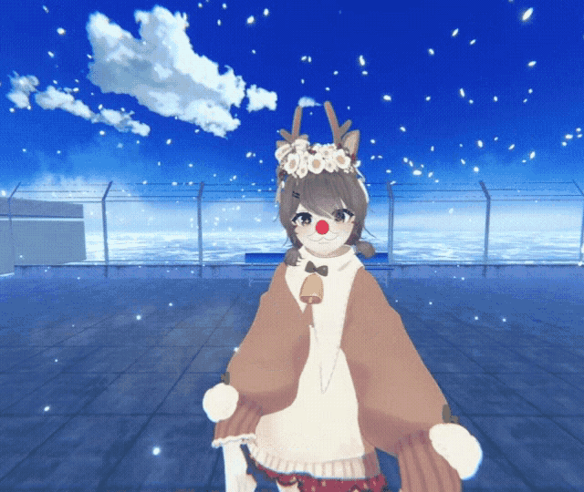 a girl dressed as a reindeer with a bell on her shoulder
