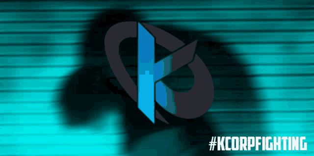 a shadow of a person is cast on a blue background with #kcorpfighting