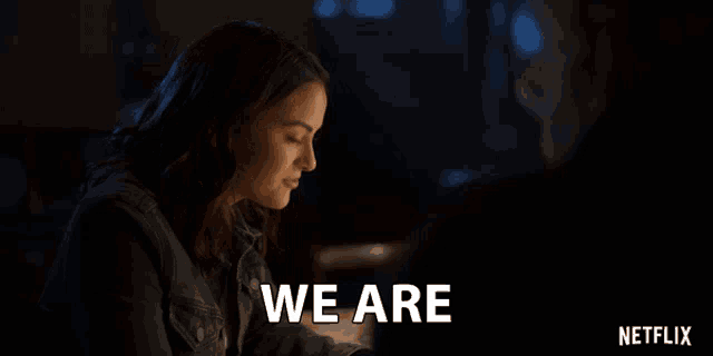 a netflix ad with a woman smiling and the words we are on the bottom