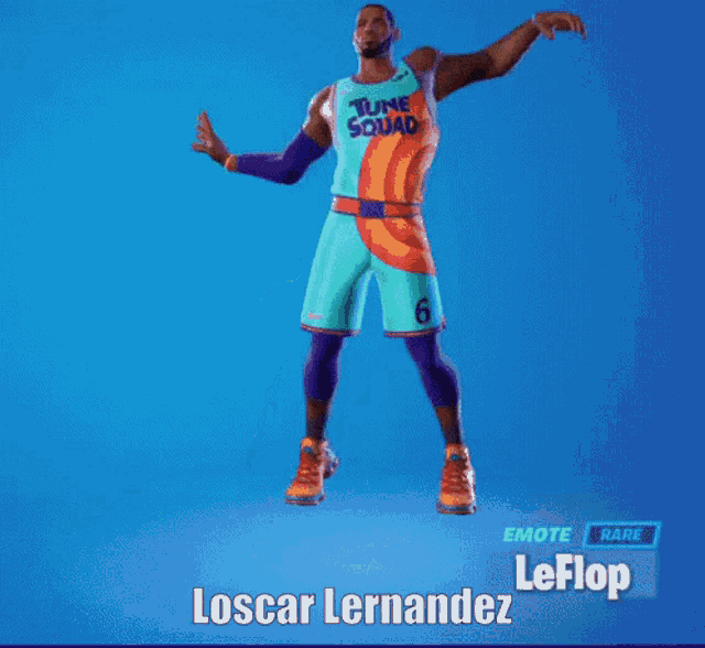 a basketball player in a tune squad uniform is dancing