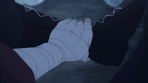 a hand with a bandage on it is holding another person 's hand