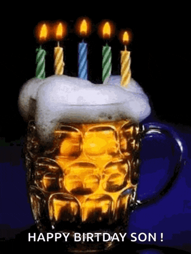 a beer mug with candles on top of it and the words `` happy birthday son '' written below it .