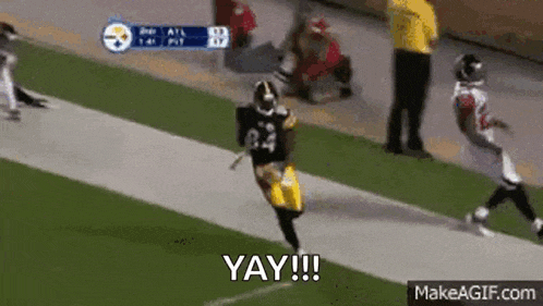 a football player is running down the field with the words `` yay !!! '' written on the side .
