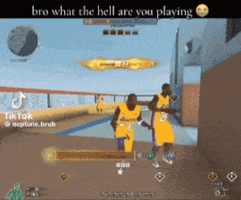 two men in lakers uniforms are playing a game