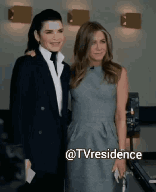 two women standing next to each other with the words @tvresidence above them