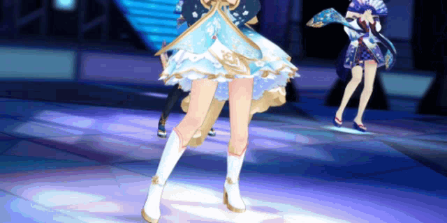 a woman in a blue dress is dancing on a stage