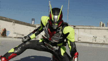 a man in a green and black superhero costume