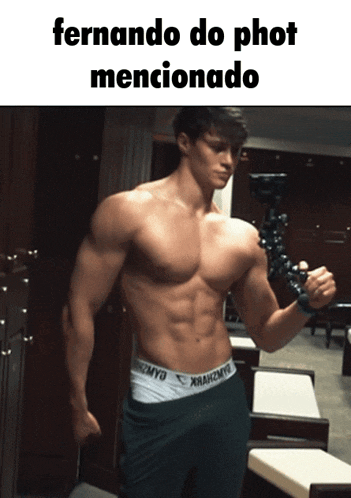 a picture of a muscular man with the words fernando do phot mentionado below him
