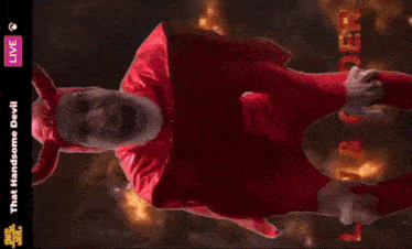 a poster for the handsome devil shows a man in a red suit with horns
