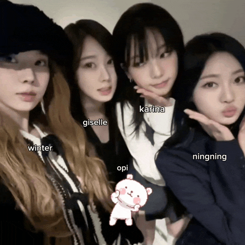 four girls posing for a picture with the names karina giselle winter and opi written on them