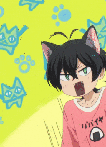 a boy with cat ears is wearing a pink shirt that says papaya