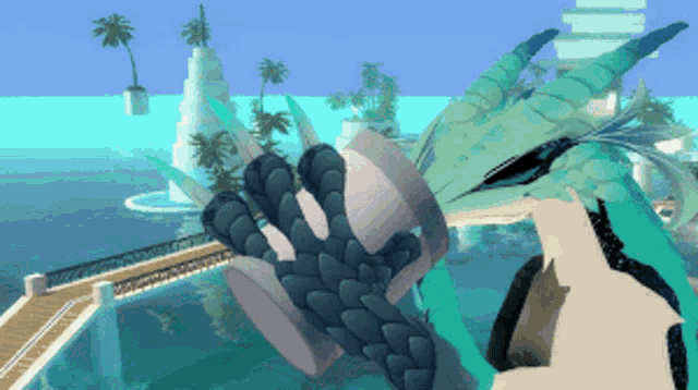 a person is holding a dragon 's claw in front of a body of water