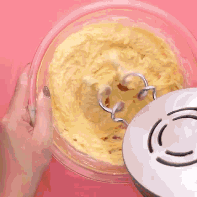 a bowl of batter with the word chocolate written on the bottom