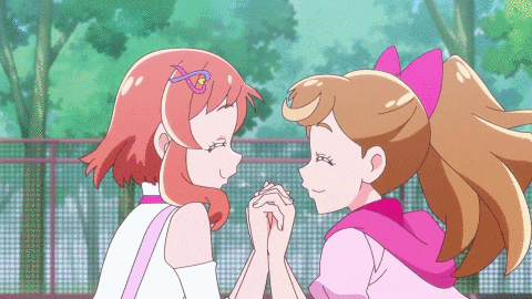 two anime girls are holding hands and one has an infinity symbol in her hair