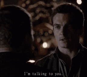 two men are talking to each other and the words i 'm talking to you are visible