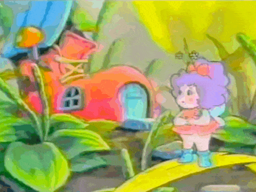 a fairy is standing in front of a pink house