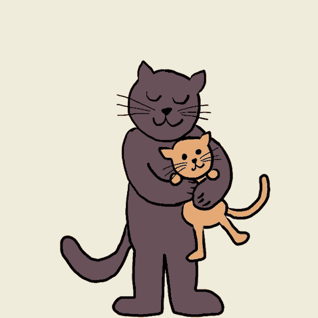 a cat is holding a kitten in its arms
