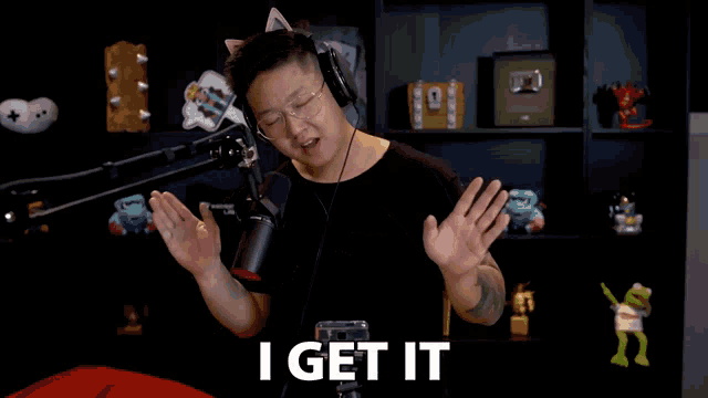 a man wearing headphones says i get it