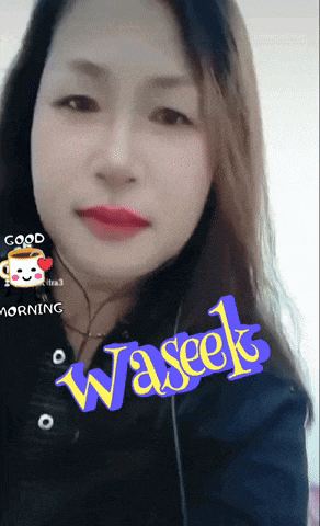 a woman is wearing headphones and has a sticker that says good morning