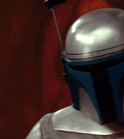 a close up of a person wearing a helmet with a flag on it