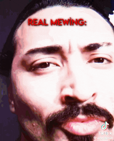 a close up of a man 's face with the words real mewing on it