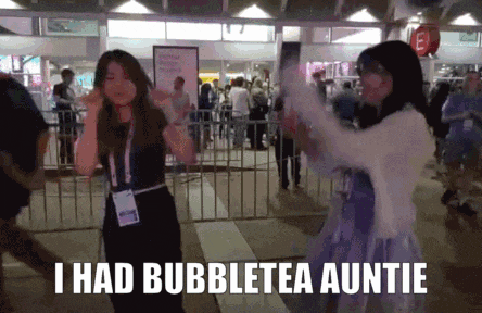 two women standing next to each other with the words i had bubbletea auntie