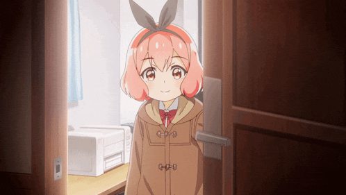 a girl with pink hair and a bow on her head stands in a doorway
