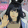 a blurry picture of a person 's face with long black hair .