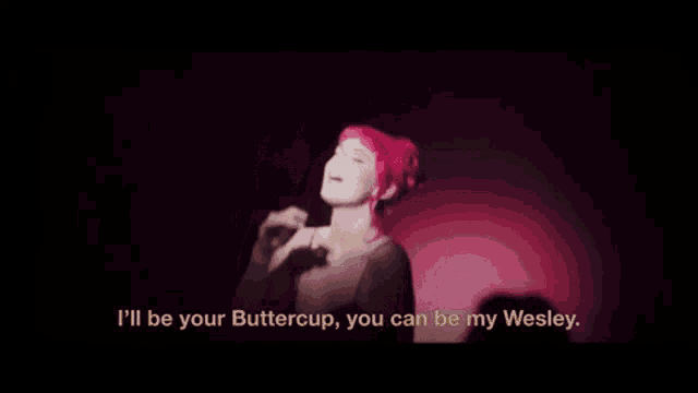 a woman with pink hair says " i 'll be your buttercup "
