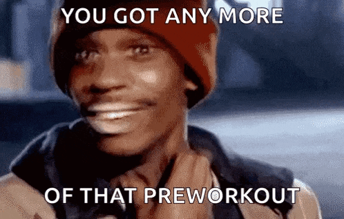 a man wearing a red hat and scarf is smiling and says you got any more of that preworkout