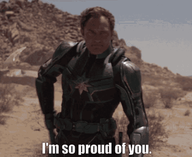 a man in a captain marvel costume says i 'm so proud of you