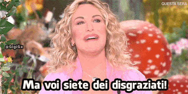 a woman in a pink shirt with the words ma voi siete dei disgraziati