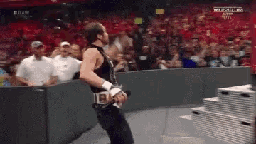 a wrestling match is being broadcasted on sky sports