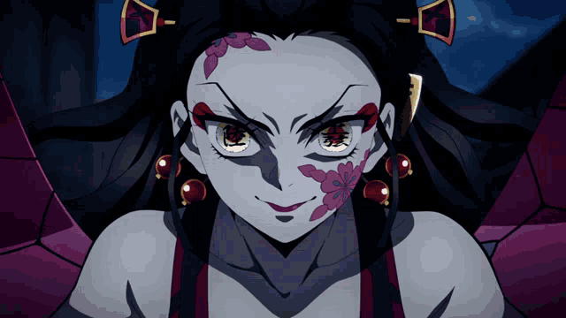 a girl with a flower on her face and earrings