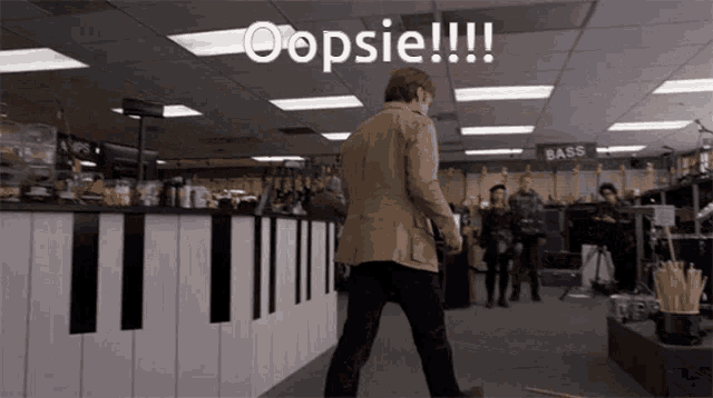 a man in a tan coat is standing in front of a piano and a sign that says oopsie