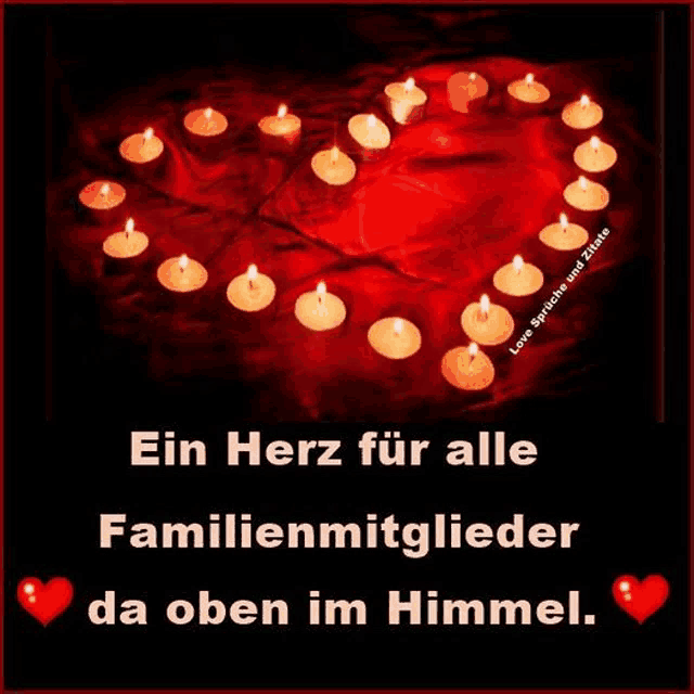 a picture of candles in the shape of a heart with the words ein herz for alle familienmitglieder da oben im himmel