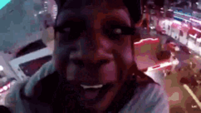 a close up of a person 's face with a monkey 's face on it .